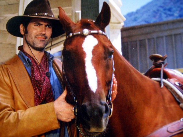 Bruce Campbell as Brisco County Jr. with one of the horses that played his faithful sidekick Comet in "The Adventures of Brisco County, Jr."